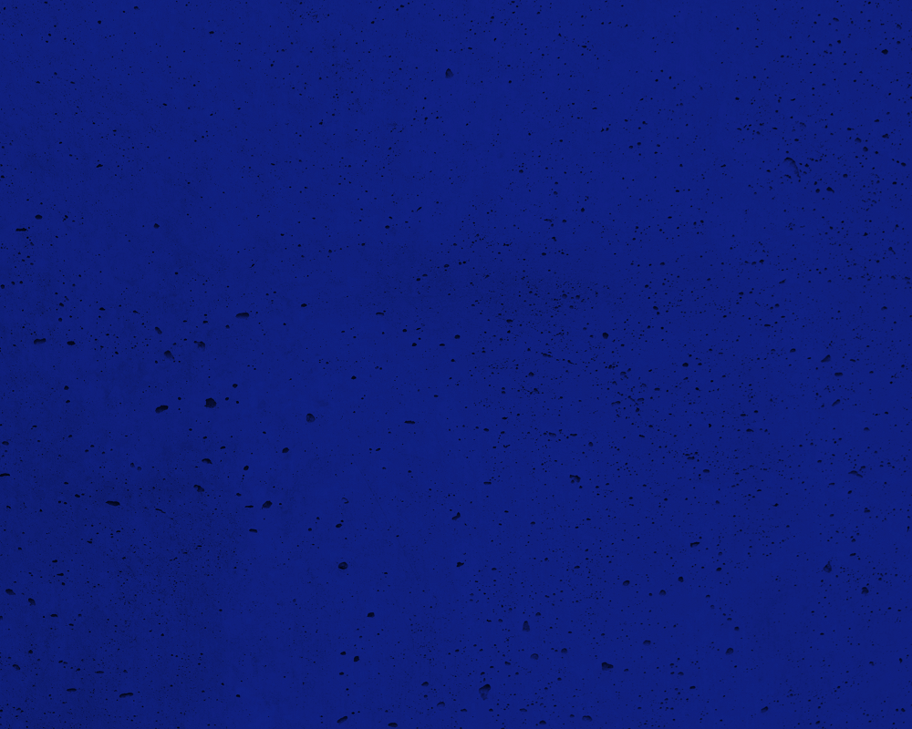 plain blue background with black speckles for banner on website